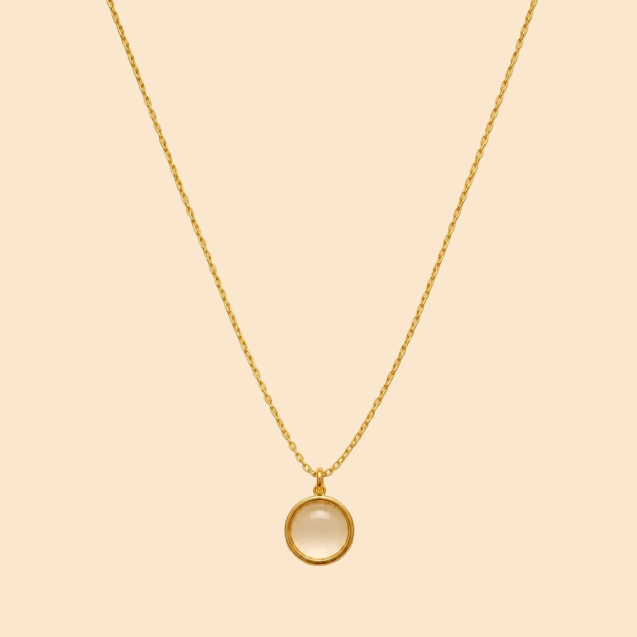Gold necklace with a moonstone round
 pendant 