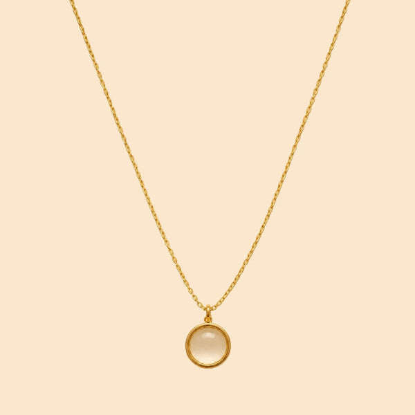 Gold necklace with a moonstone round
 pendant 