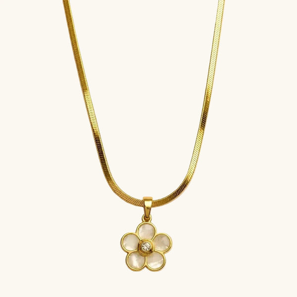 Gold necklace with a floral pendant